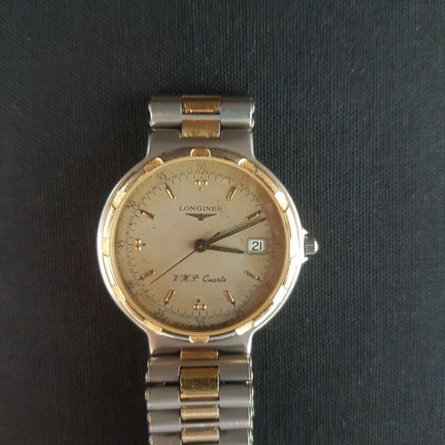 Longines Conquest V.H.P quartz used, gold and silver