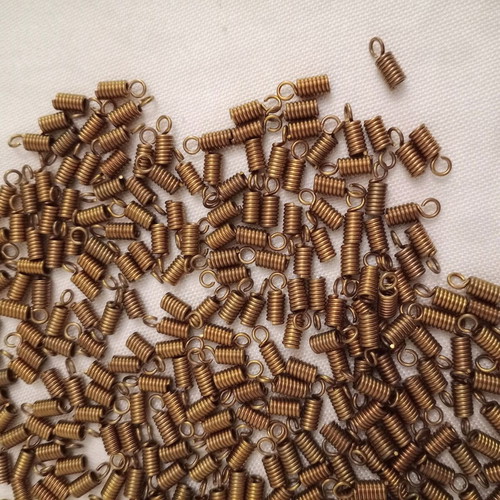 Metal bronze jewelry end caps 348 pcs like new