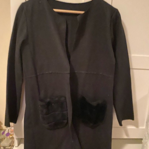 Black cardigan with warm fur pockets, size large, like new