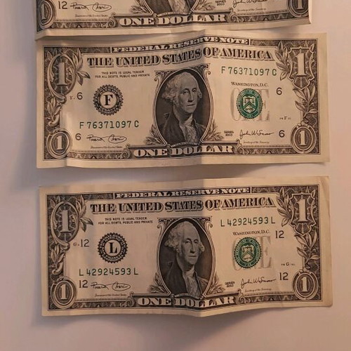 Greek and American paper money used