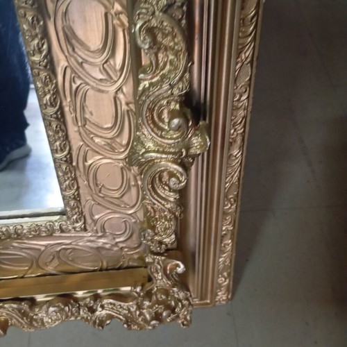 Vintage retro mirror with carved ornate gold frame used