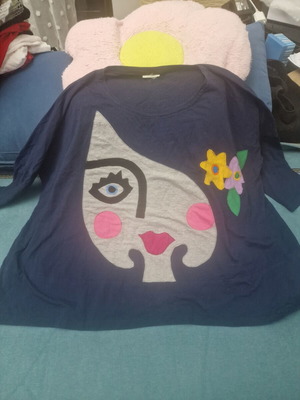 Blue blouse XXL like new with artistic abstract face design