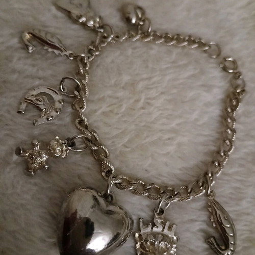 Silver bracelet with charms like new