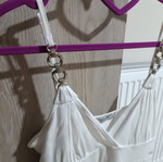 White sleeveless top with silver details