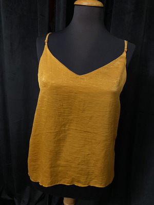 Satin sleeveless blouse new, size M, gold color
