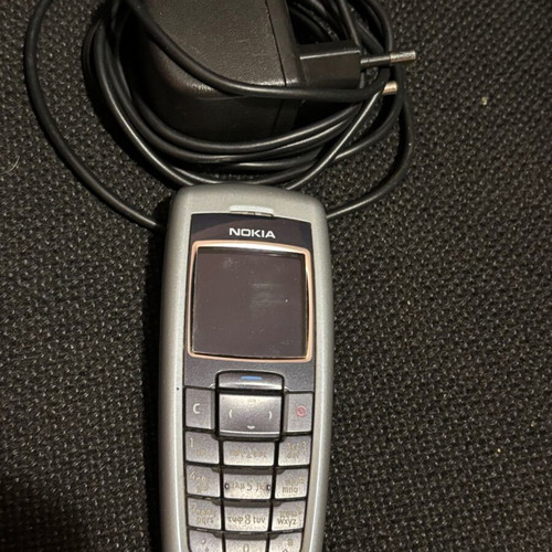 Nokia mobile phone used, working normally, silver