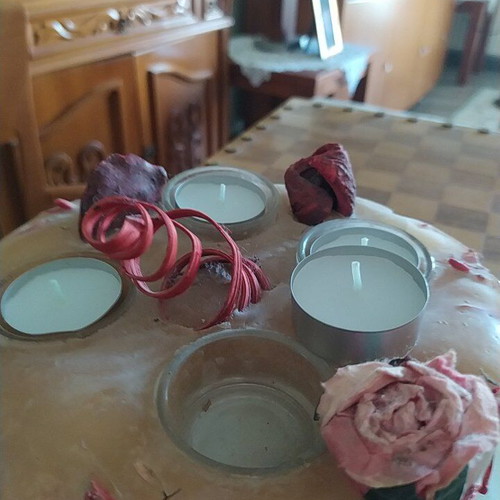 Decorative candle with dried flowers used