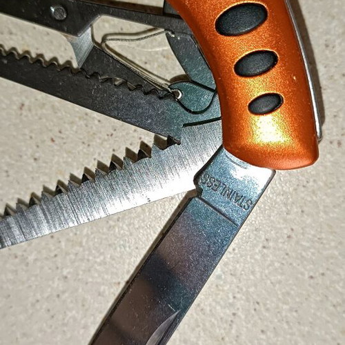 Swiss Army style multi-tool, orange, stainless steel