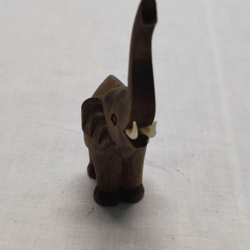 Vintage wooden elephant used with ivory tusks