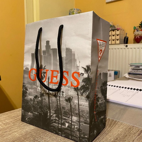 Guess white polo shirt new, size Large to Medium
