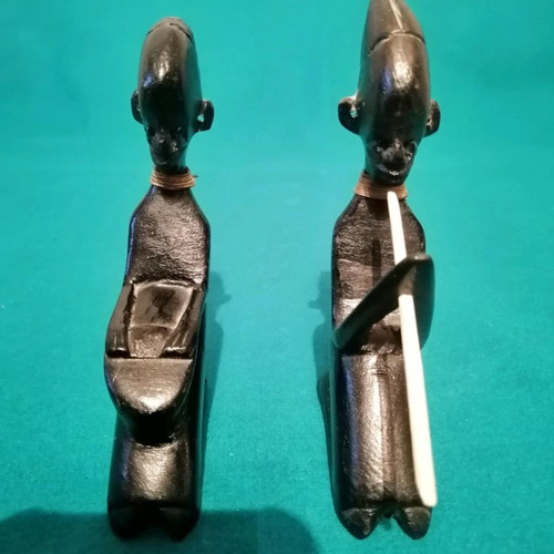 Ebony woodcarving set used, two African figures playing musical instruments