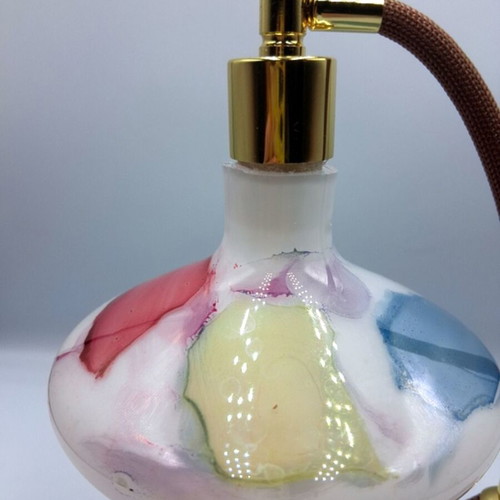 Vintage glass perfume bottle with new atomizer