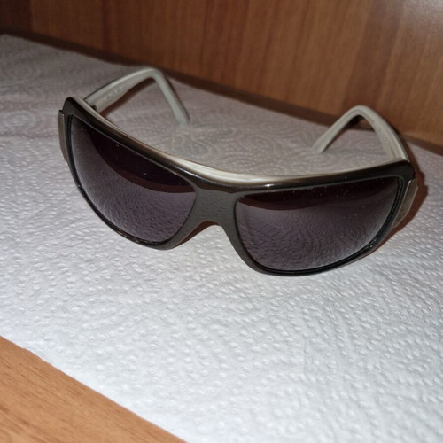 Sunglasses used, black and purple