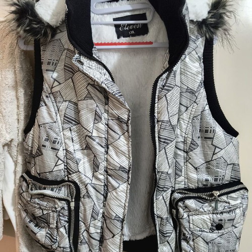 Vest used, black and white, in good condition