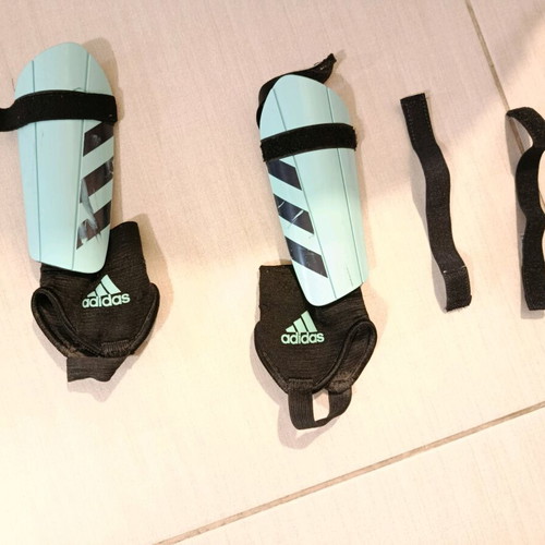 Adidas kids shin guards used with adjustable strap
