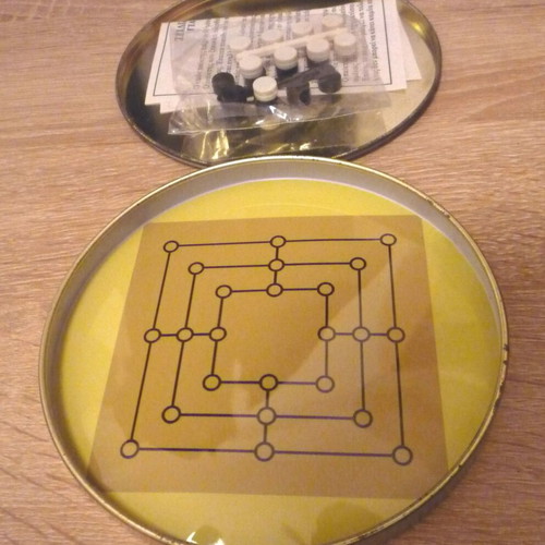 Magnetic travel board games Griniaris and tic-tac-toe used