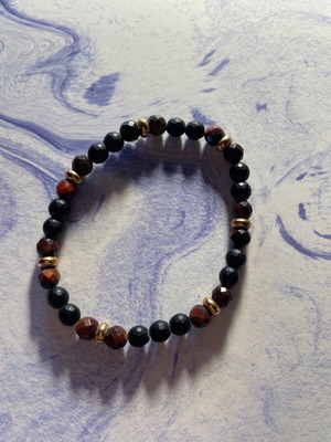 Bracelet with black, gold and brown beads like new