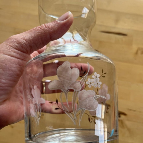 Glass bulb vase used with botanical detail