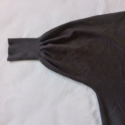 Skondras knitted cardigan used, black, size large with bat sleeve