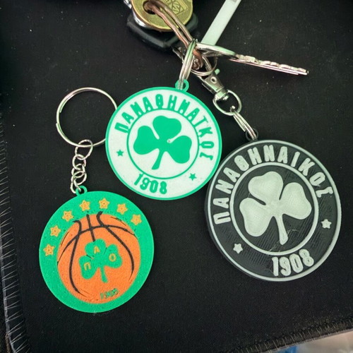 Panathinaikos keychain set like new, glow in the dark and double-sided