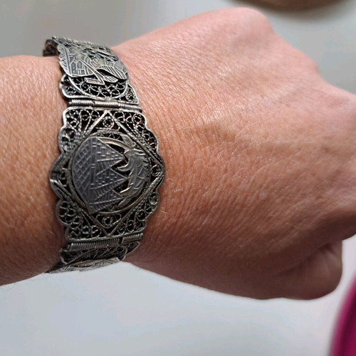 Silver filigree bracelet like new