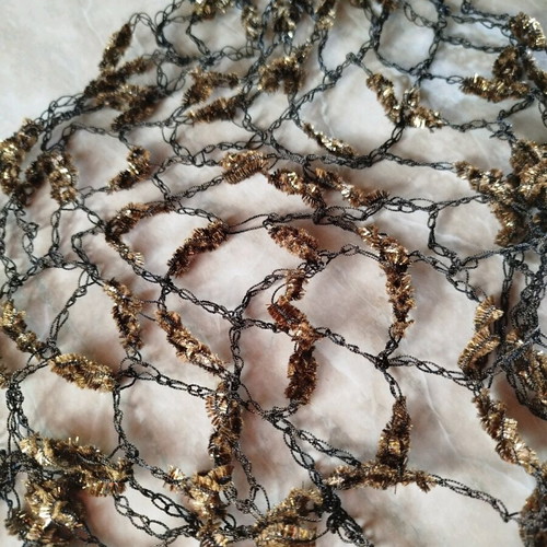 Crocheted spring scarf new, brown gold