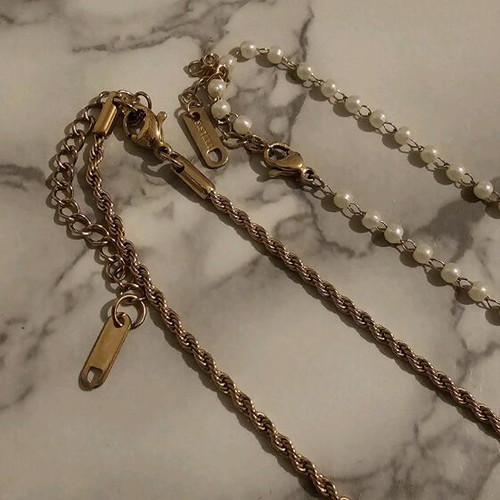 Stainless Steel Necklace Set like new with pearls and twisted design