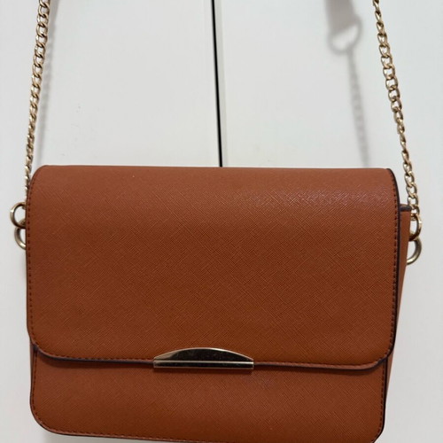 Small tan crossbody bag lightly used