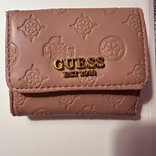 Guess wallet used, small size, pink with many compartments