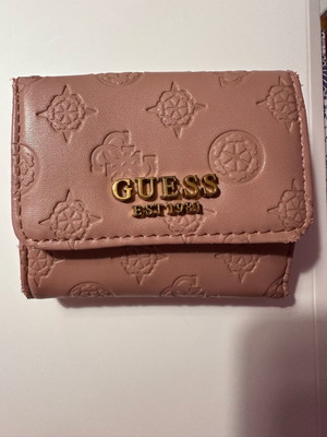 Guess wallet used, small size, pink with many compartments