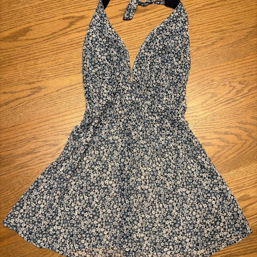 Floral women's top like new, halter neck with back zipper, semi-transparent hem