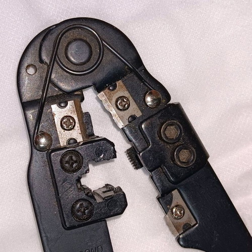 Crimping tool like new for network and telephone plugs