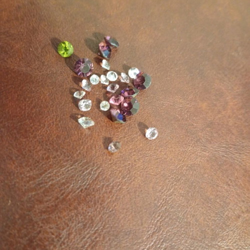 Semi-precious and precious stones like new, set of 23, round cut