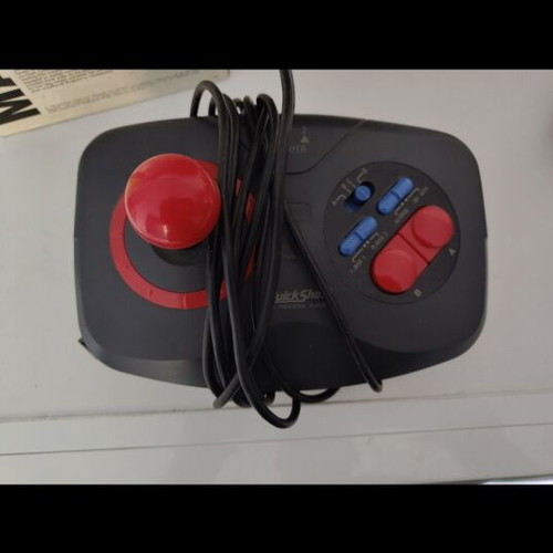 Retro joystick used for old consoles with box