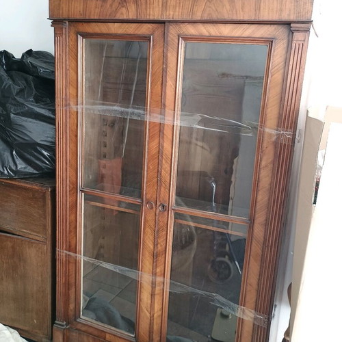Vintage wooden bookcase used with geometric design and glass doors