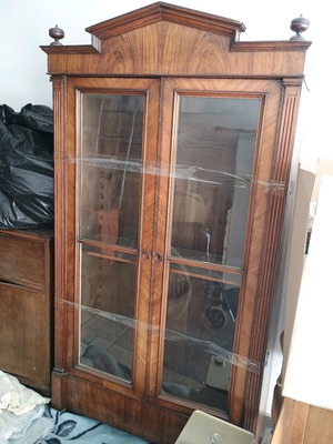 Vintage wooden bookcase used with geometric design and glass doors