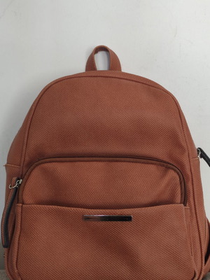 Back pack tan used with internal and external pockets