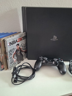 PlayStation 4 Pro 1TB like new with 7 games and DualShock 4
