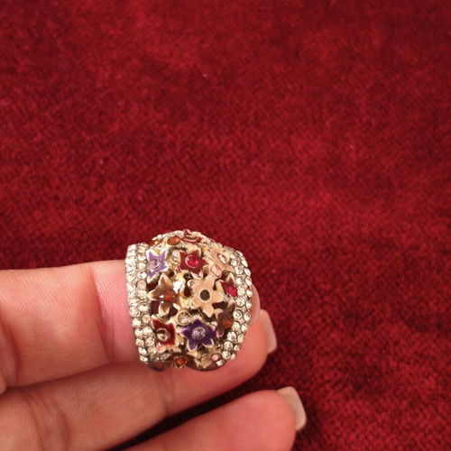 Vintage statement ring used with colorful flowers and rhinestones