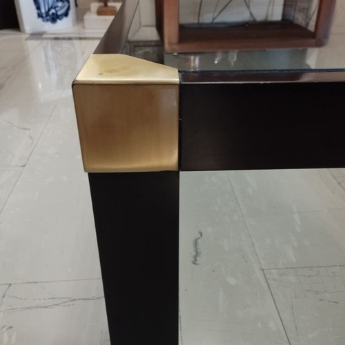 Varagkis walnut coffee table like new with brass details and smoked glass