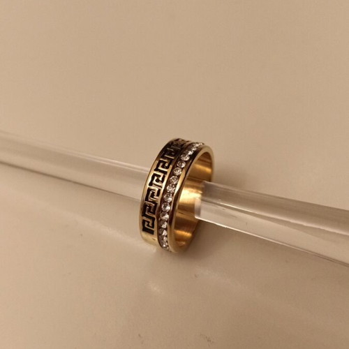 Bracelet and ring set made of steel with archaic design and rhinestones, new, gold