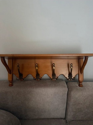 Wooden hanger like new with 4 hooks and shelf