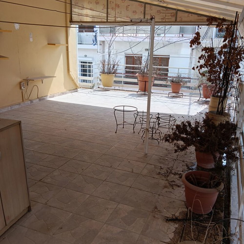 Multipurpose building with apartment and commercial space, Galatsi