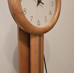 Hermle wall clock with pendulum like new, solid wood