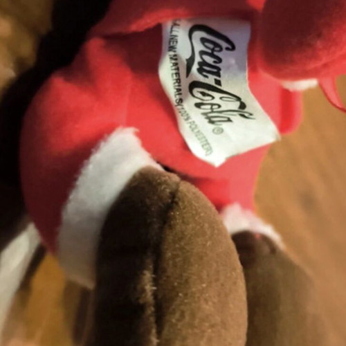 Collectible Coca Cola plush doll like new, 1990 Christmas edition