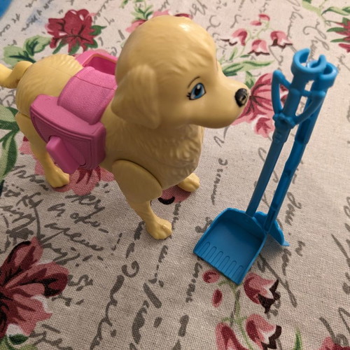 Barbie dog used with mechanism for waste