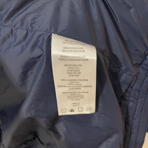 Tommy Hilfiger women’s puffer jacket used, size medium, colorblock design