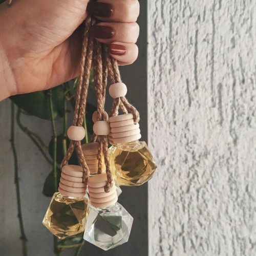 Handmade car air freshener like new with glass bottle and wooden cap