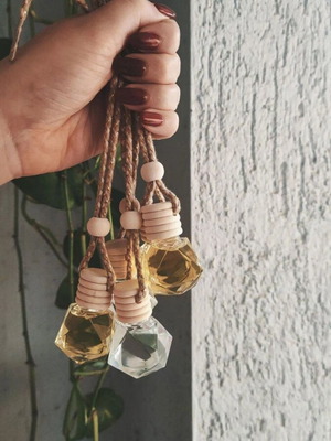 Handmade car air freshener like new with glass bottle and wooden cap