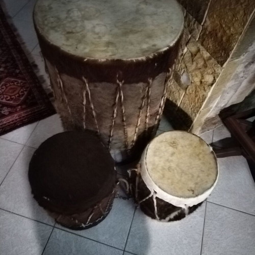 African collectible drums like new, one large and two small